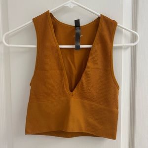 Urban outfitters out from under Hailey plunge top